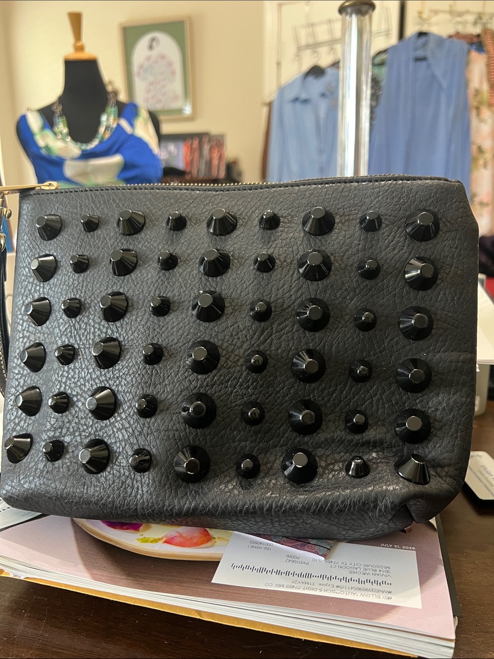 Traci Lynn studded to the max clutch!